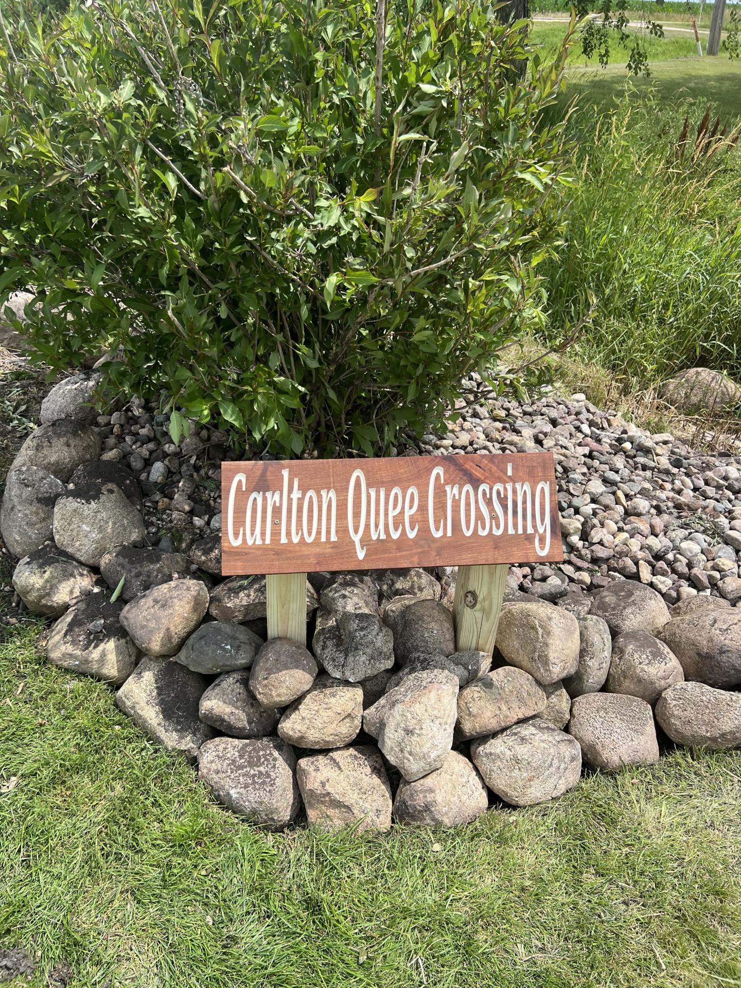 Carlton Quee Sign